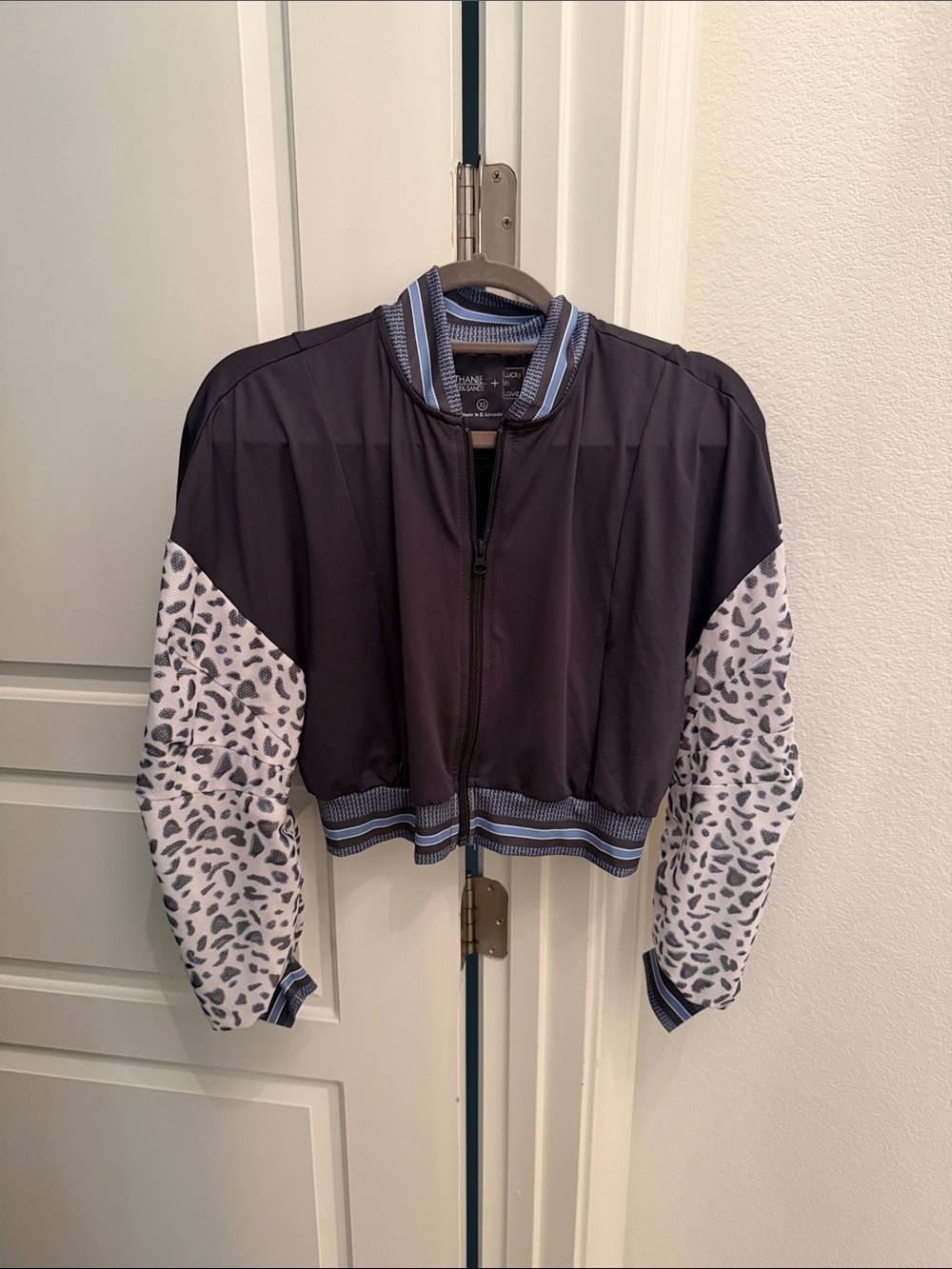 Lucky in Love Black Cropped Bomber Jacket with White Leopard-Print Sleeves